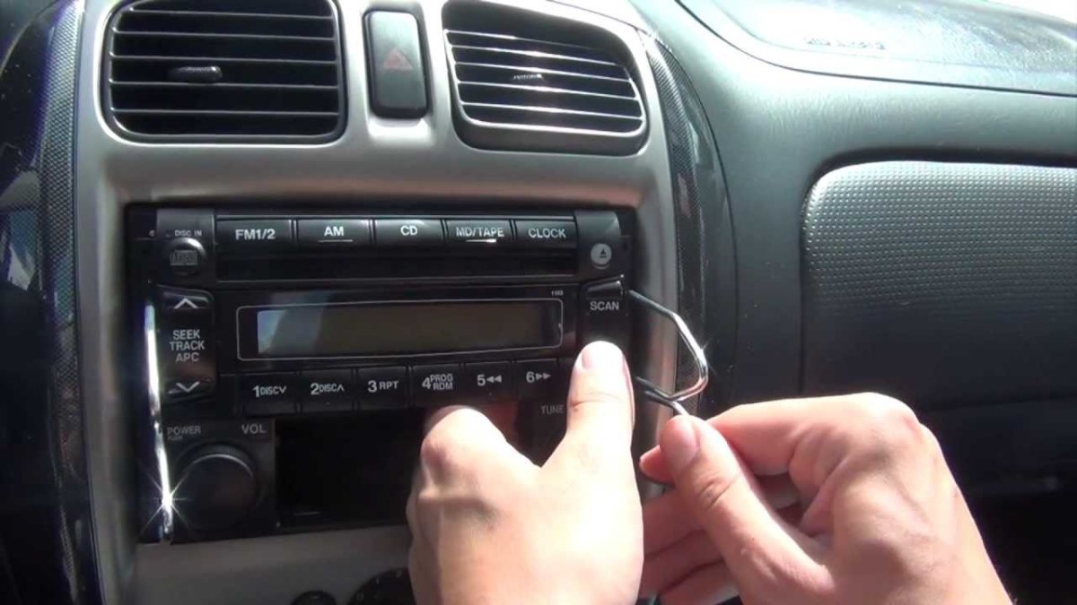 Магнитола Мазда Демио