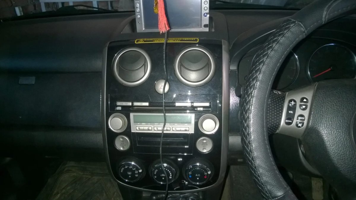 Магнитола Мазда Вериса 2007