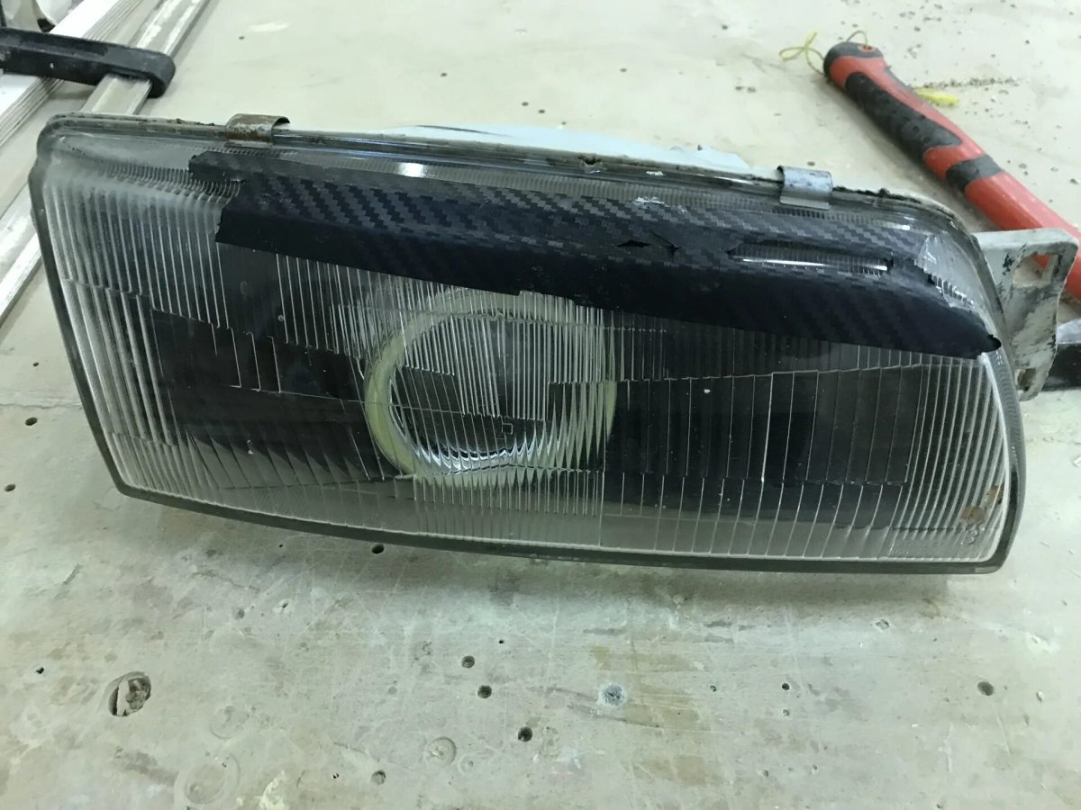 Фара Mitsubishi Lancer 6