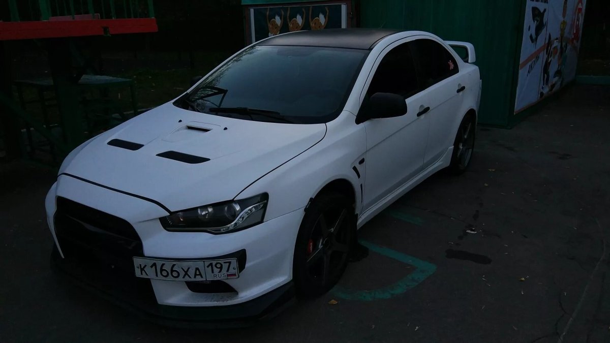 Митсубиси Лансер 10 белый фото