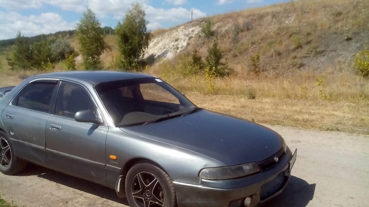 Мазда Кронос хэтчбек